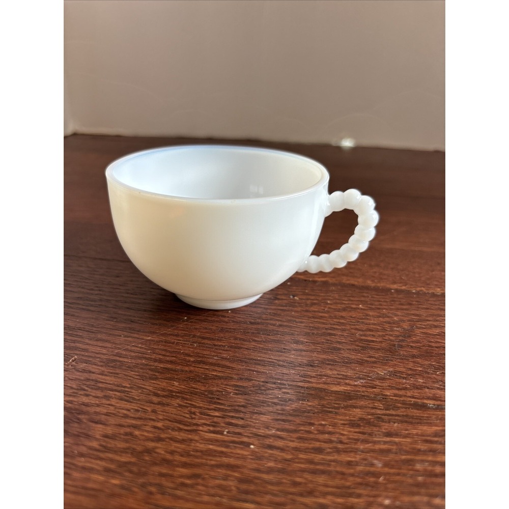 Vintage plain milk glass punch/coffee with beaded handle
